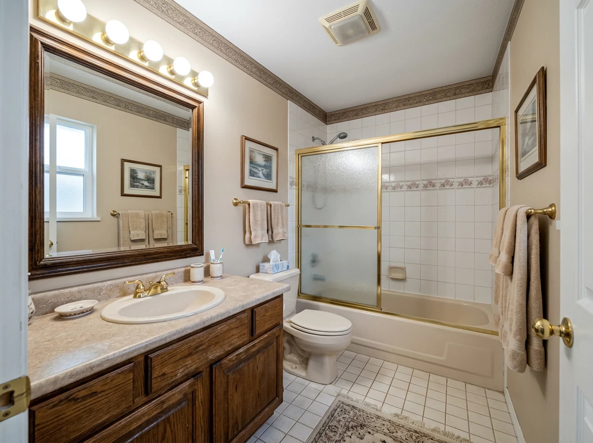 Guest bathroom — before, the original dated photo.